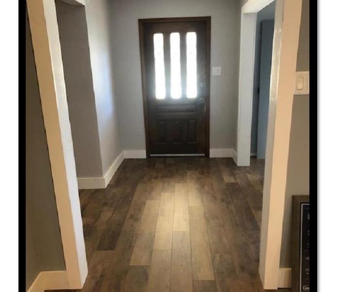 Wood flooring and painted entry