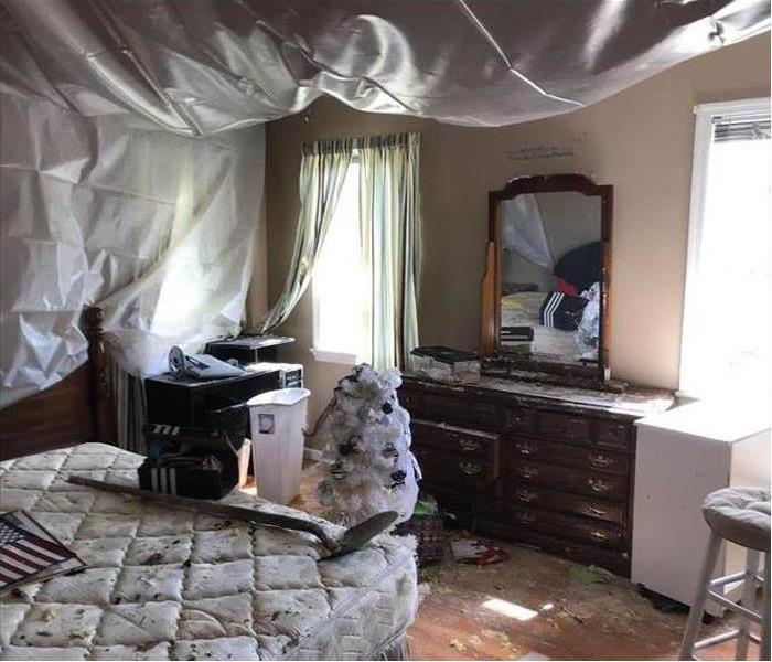 Bedroom damaged by storm