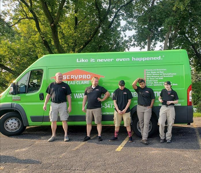 Green Van with Employees