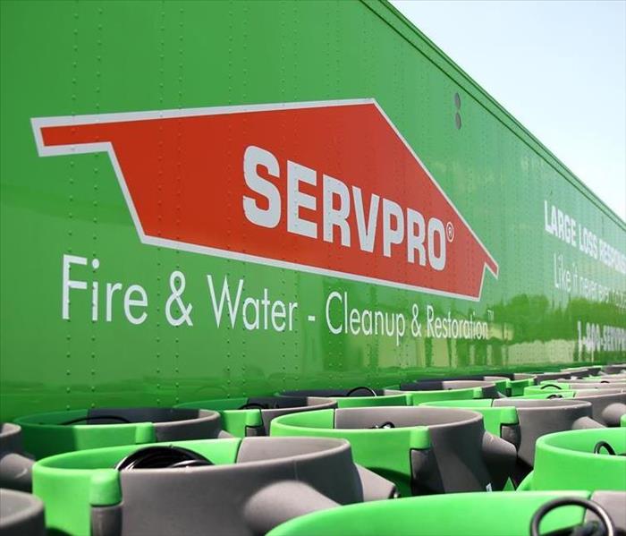 Green SERVPRO semi-trailer and fans